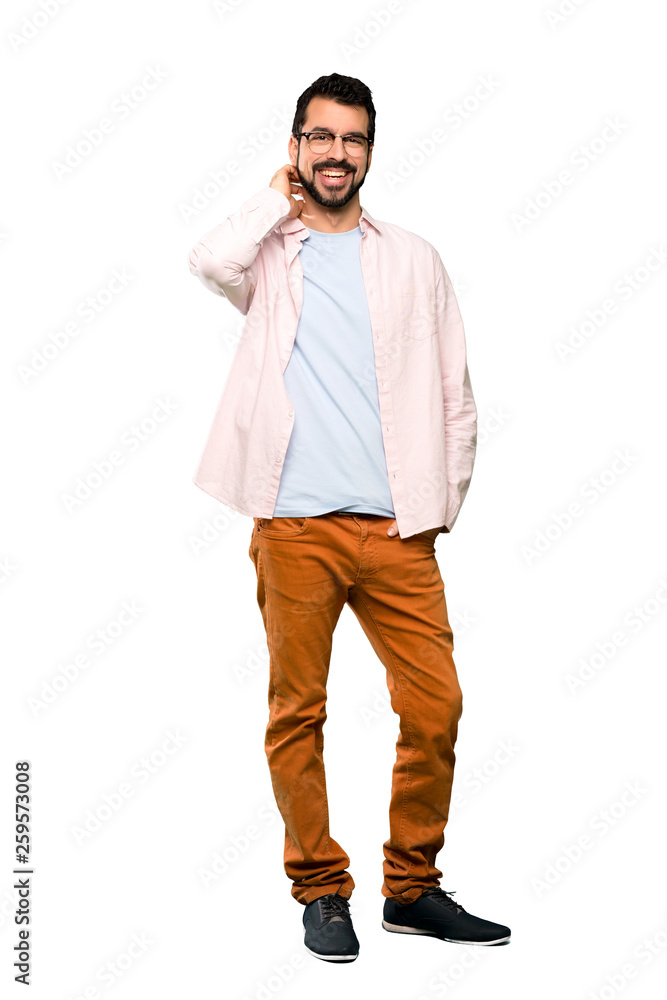 Full-length shot of Handsome man with beard smiling over isolated white background Full-length shot of Handsome man with beard smiling over isolated white background