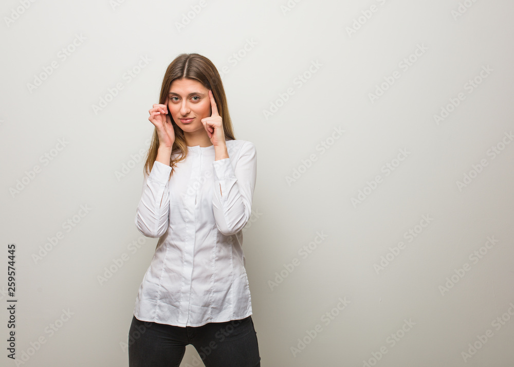 Young russian girl doing a concentration gesture Young russian girl doing a concentration gesture