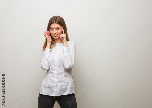 Young russian girl doing a concentration gesture