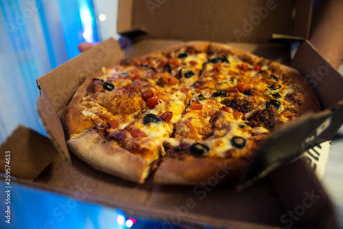 Whole hot just delivered dominos pizza, movie dinner at home