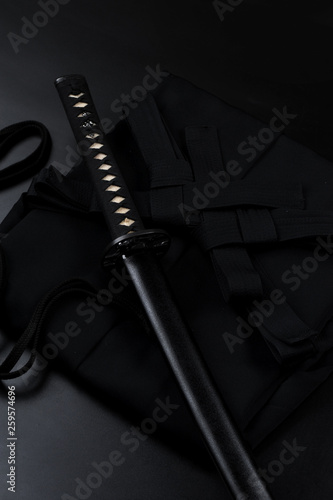 Japanese katana samurai sword. Aikido hakama, martial arts uniform