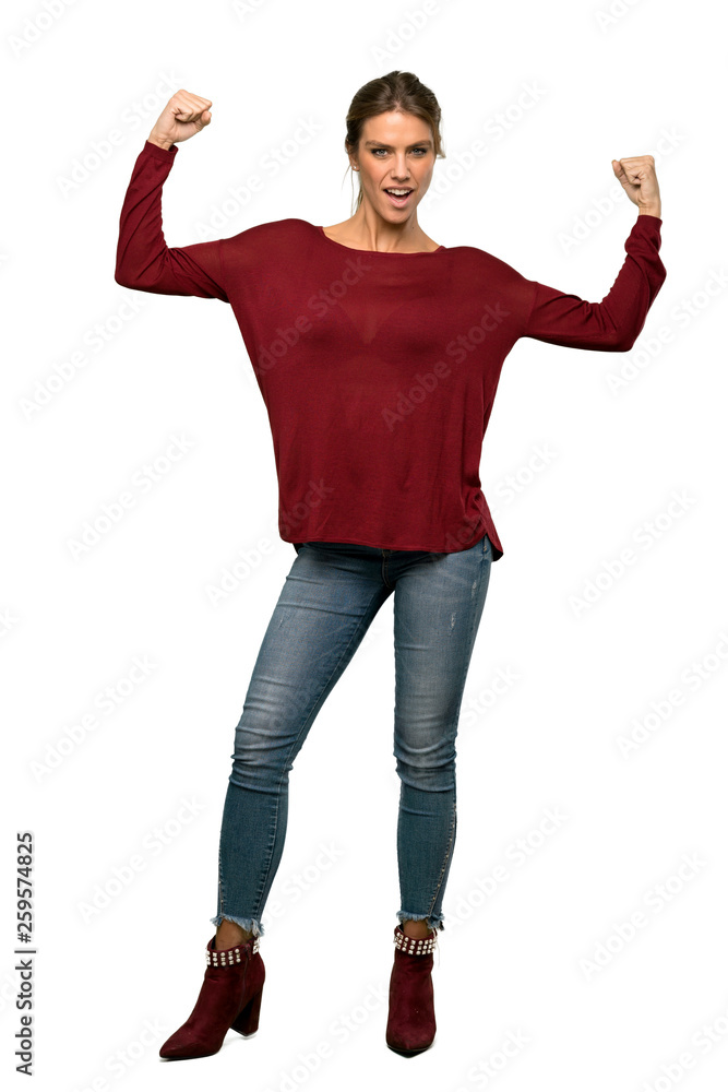 A full-length shot of a Blonde woman proud and self-satisfied over isolated white background A full-length shot of a Blonde woman proud and self-satisfied over isolated white background