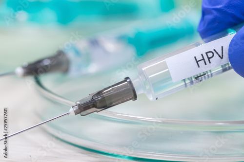 hpv vaccination syringe background photo