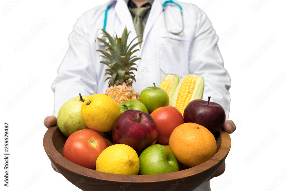 Doctor holding basket assort fresh fruits and vegetables isolated on white background.