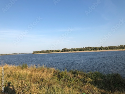 landscape with lake and blue sky