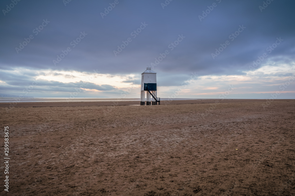 A cloudy evening at the Low Lighthouse in Burnham-on-Sea, Somerset, England, UK