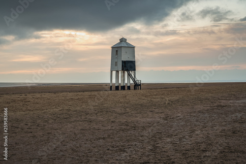 A cloudy evening at the Low Lighthouse in Burnham-on-Sea, Somerset, England, UK photo