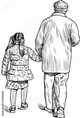 Grandfather and granddaughter go for a walk