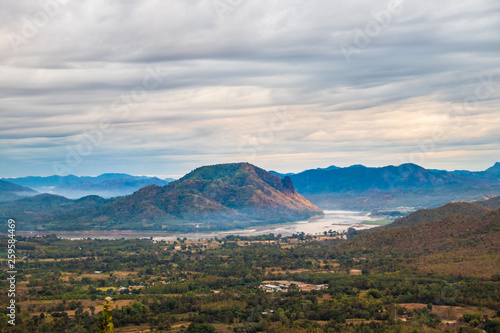 Sunrise at Phu Thok, view misty morning  around with mist and cloudy sky,  beautiful mountain. Khan District, Loei, Thailand
