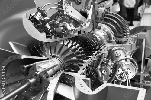 engine of an airplane in section black and white photo