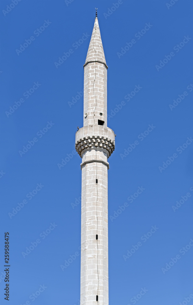 minaret against a clear blue sky