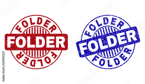 Grunge FOLDER round stamp seals isolated on a white background. Round seals with grunge texture in red and blue colors. Vector rubber imprint of FOLDER caption inside circle form with stripes.