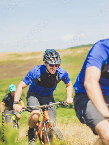 Mountain Biker Smiling with Friends