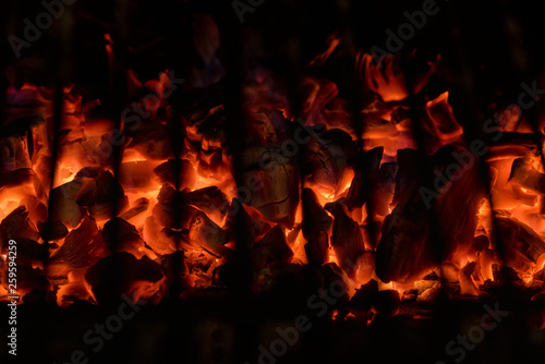View of glowing charcoal of BBQ grill