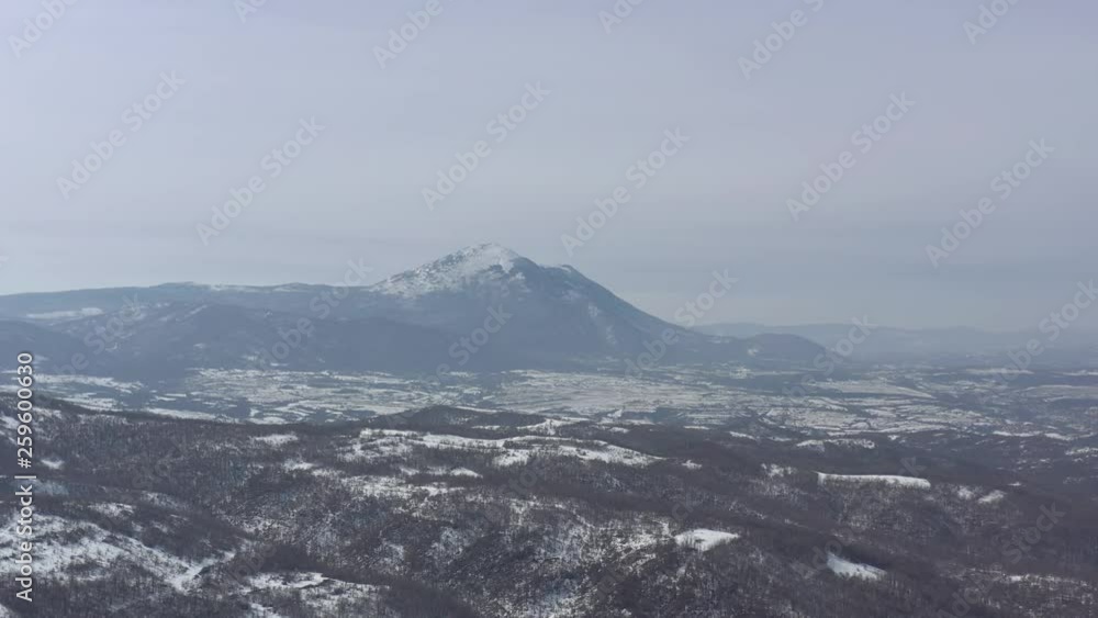 Pyramid shape of Rtanj mountain by winter 4K drone video Pyramid shape of Rtanj mountain by winter 4K drone video