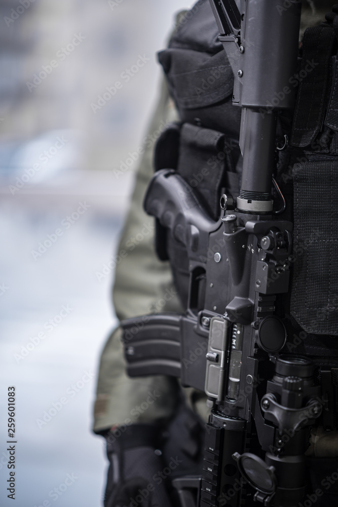 Closeup Rifle on Security Personnel Closeup Rifle on Security Personnel