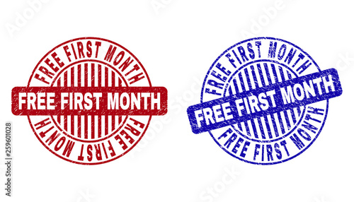 Grunge FREE FIRST MONTH round stamp seals isolated on a white background. Round seals with grunge texture in red and blue colors.