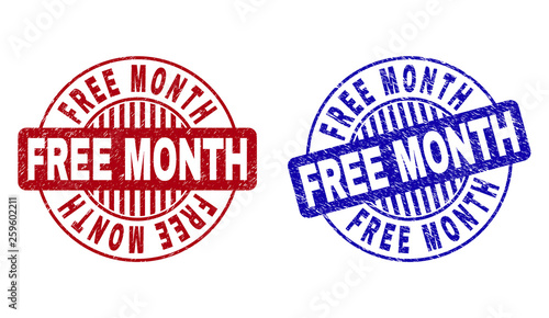 Grunge FREE MONTH round stamp seals isolated on a white background. Round seals with grunge texture in red and blue colors. Vector rubber overlay of FREE MONTH text inside circle form with stripes.