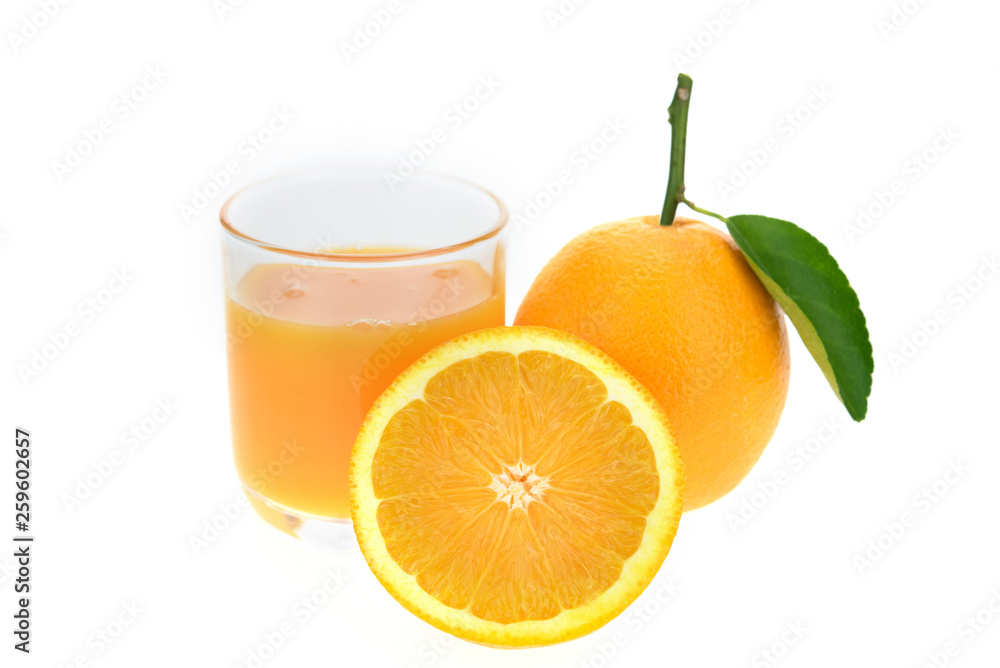 Orange juice and oranges with leaves Orange juice and oranges with leaves