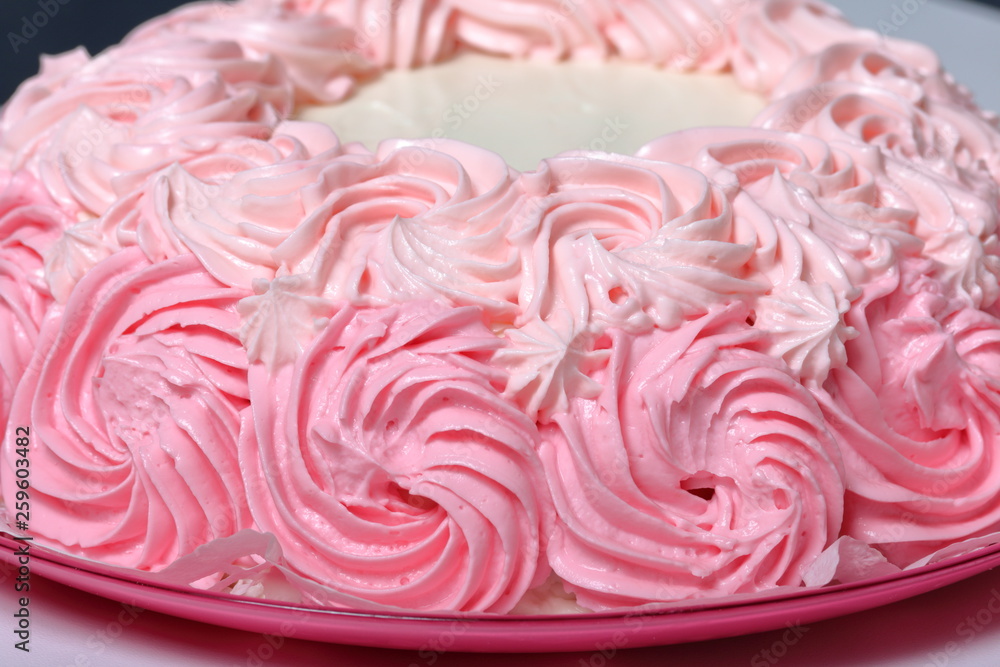 Cooking cake, decorated with a cream of different colors. Cooking cake, decorated with a cream of different colors.