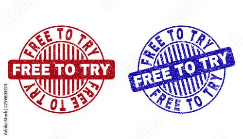 Grunge FREE TO TRY round stamp seals isolated on a white background. Round seals with grunge texture in red and blue colors. Vector rubber overlay of FREE TO TRY label inside circle form with stripes.