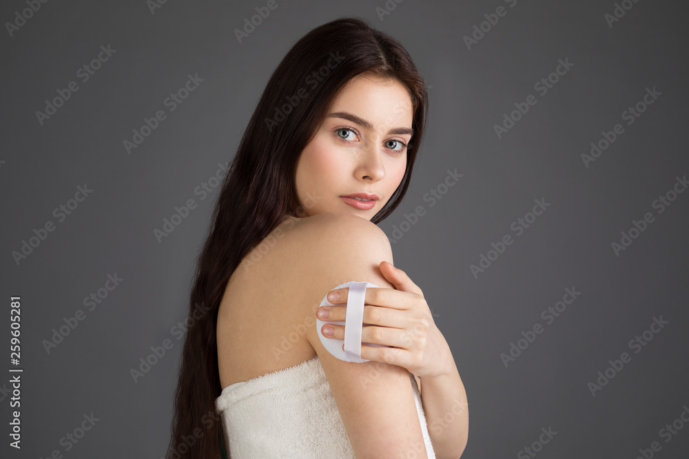 Young beautiful woman with brunette hair in bath towel Young beautiful woman with brunette hair in bath towel