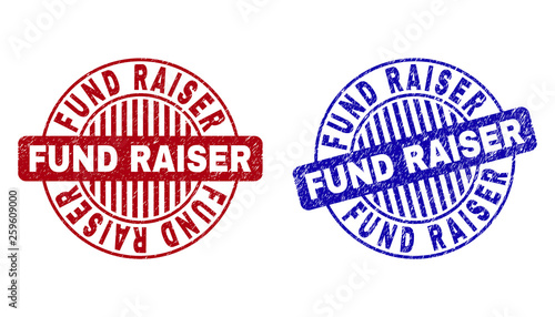 Grunge FUND RAISER round stamp seals isolated on a white background. Round seals with distress texture in red and blue colors.
