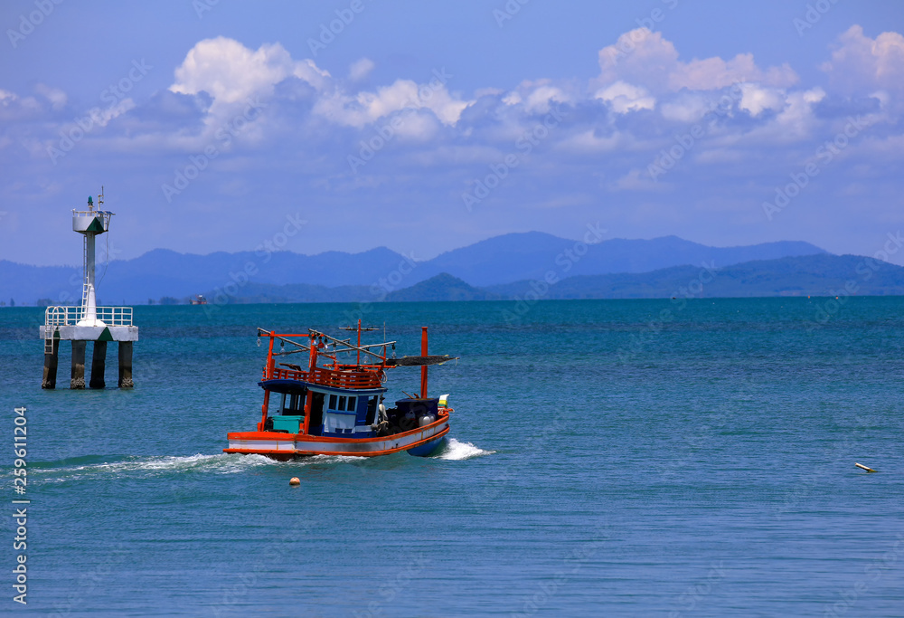 Wooden fisherman boat run to the sea