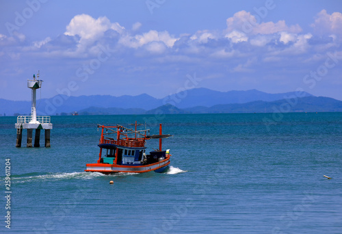 Wooden fisherman boat run to the sea