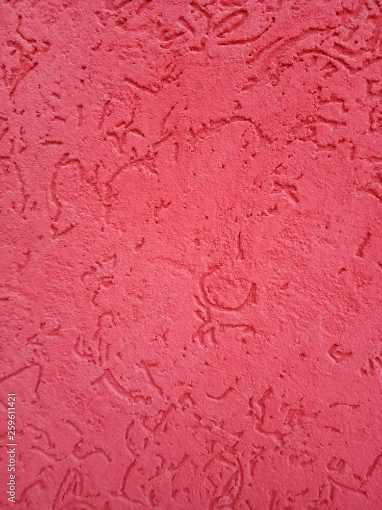 The texture of the stone wall painted with dry purple plaster. The texture of the stone wall painted with dry purple plaster.
