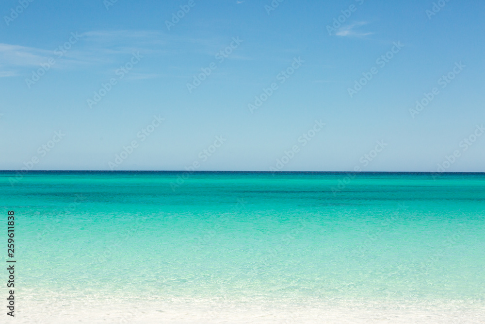 Beautiful view of the Caribbean Sea. Skyline clear blue sky and azure water. Dominican Republic. Beautiful beach. Rest and relaxation Beautiful view of the Caribbean Sea. Skyline clear blue sky and azure water. Dominican Republic. Beautiful beach. Rest and relaxation