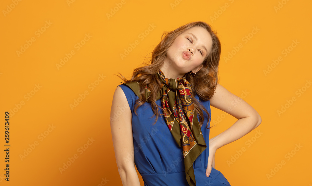 Casual girl having fun on color background. Casual girl having fun on color background.