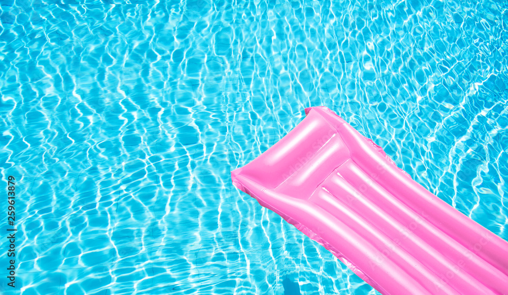 Beach summer holiday background. Inflatable air mattress on swimming pool  water. Pink lilo and summertime accessories on poolside. Top view and copy  space. Banner Stock Photo | Adobe Stock