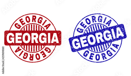 Grunge GEORGIA round stamp seals isolated on a white background. Round seals with grunge texture in red and blue colors. Vector rubber imprint of GEORGIA tag inside circle form with stripes.