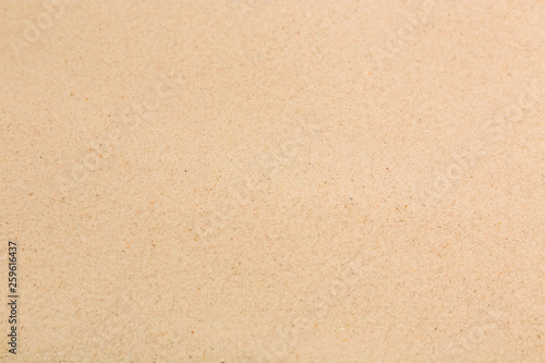 Dry sand on beach as background, closeup