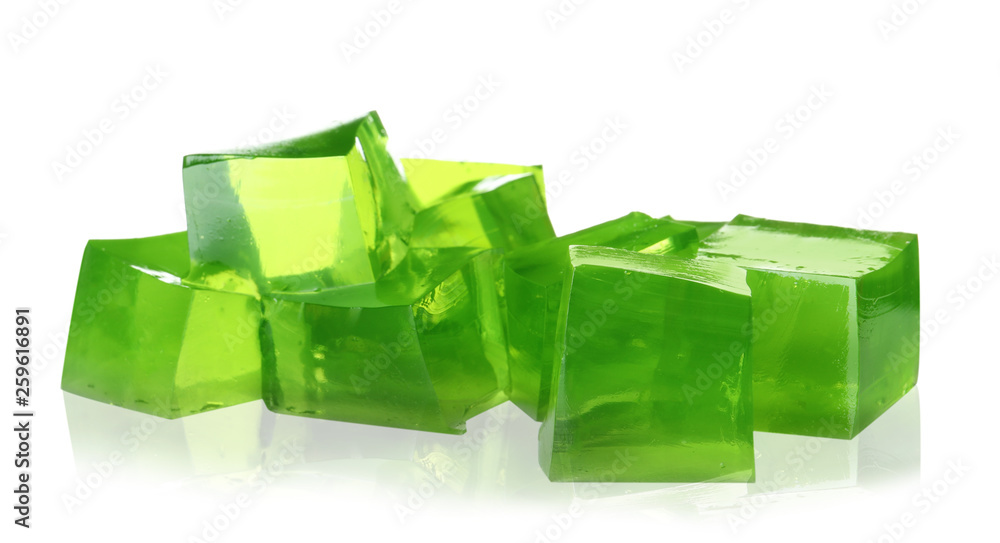 Heap of green jelly cubes on white background Heap of green jelly cubes on white background