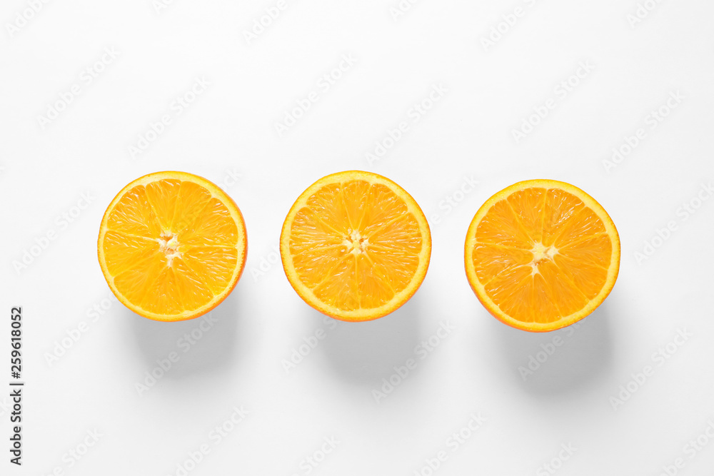 Juicy oranges on white background, top view Juicy oranges on white background, top view