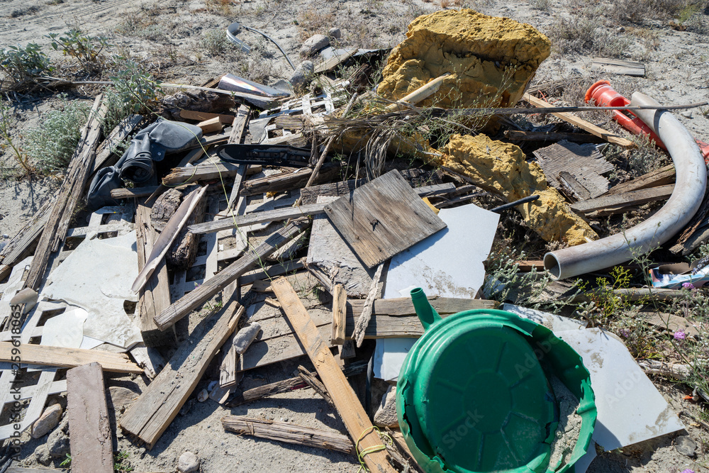Obraz premium Pile of garbage, junk and litter dumped in the desert. Taken in the Salton Sea area of California in Imperial County