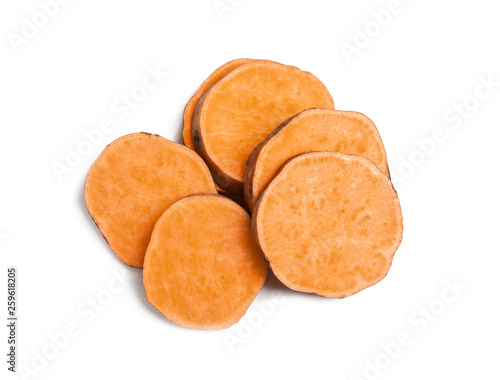Slices of ripe sweet potato on white background, top view © New Africa
