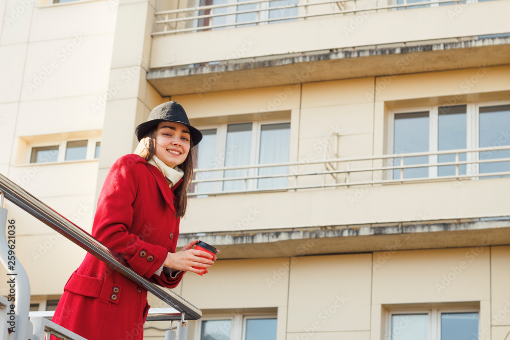 Businesswoman drinks coffee in a sunny day Businesswoman drinks coffee in a sunny day