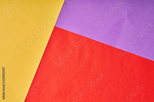Multi-colored background of several sheets of paper