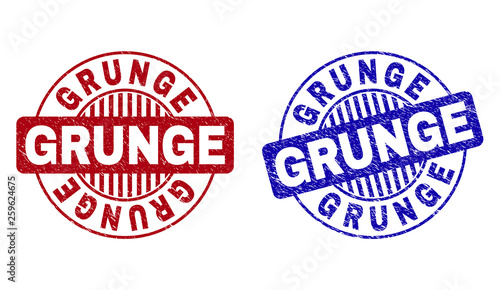 Grunge round stamp seals isolated on a white background. Round seals with grunge texture in red and blue colors. Vector rubber imprint of GRUNGE label inside circle form with stripes.
