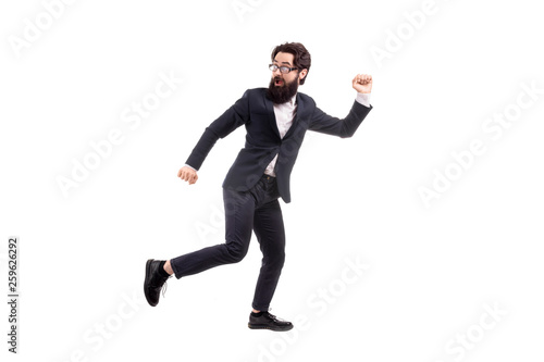Full length portrait of a run away bearded businessman, isolated on white background