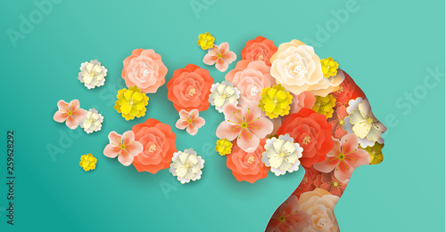 Papercut woman head with spring flowers