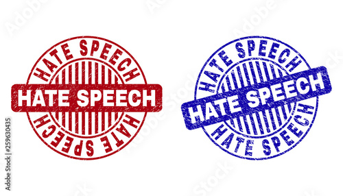 Grunge HATE SPEECH round stamp seals isolated on a white background. Round seals with grunge texture in red and blue colors.