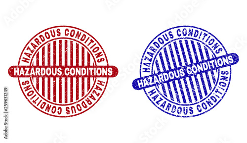 Grunge HAZARDOUS CONDITIONS round stamp seals isolated on a white background. Round seals with grunge texture in red and blue colors.