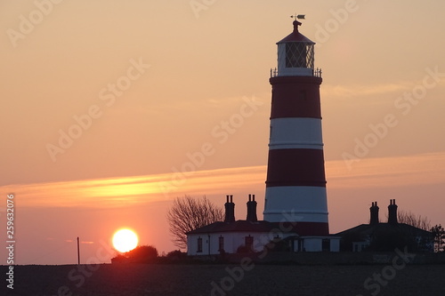 Sunset views of Happisburgh Lighthouse - Norfolk, England, UK photo