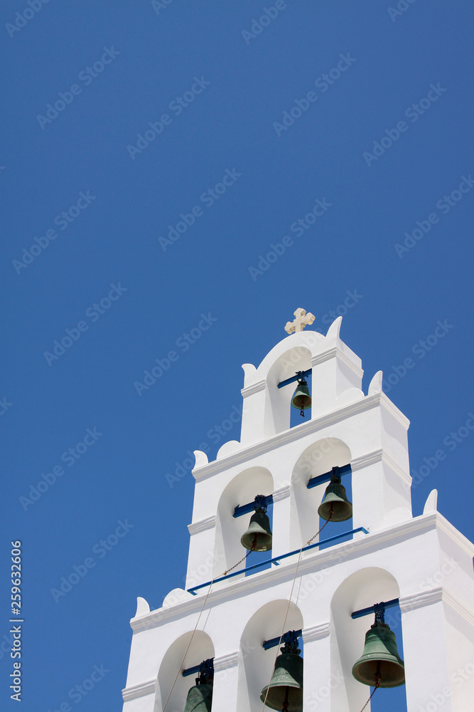Church roof against a clear blue sky in Santorini Greece Church roof against a clear blue sky in Santorini Greece