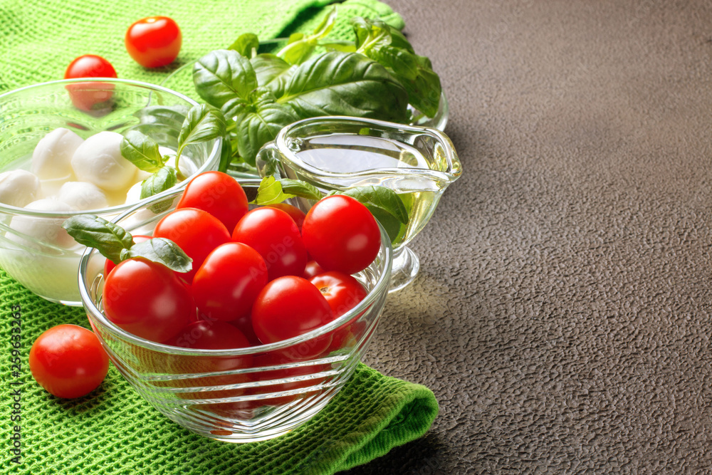 Caprese Salad. Tomatoes, basil, mozzarella and oil.