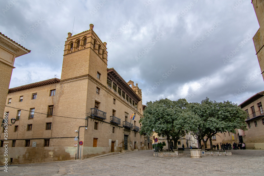 the facade of the town hall and cathedral square in Huesca